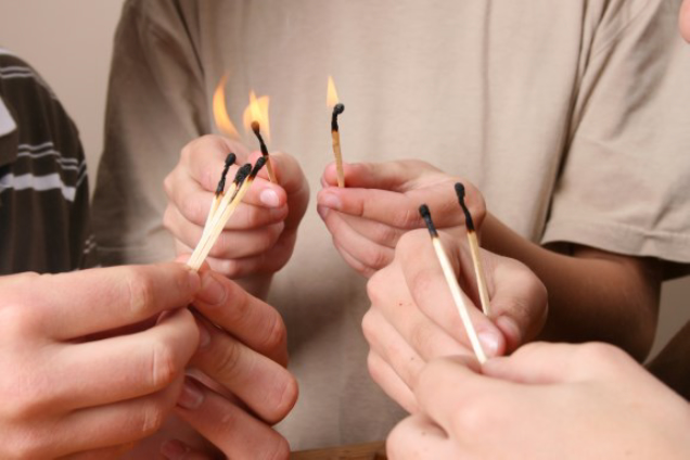 kids lighting matches