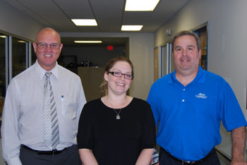 Albany County Clerk Bruce Hidley and Deputy County Clerk Craig Carlson wish Brandy Alden